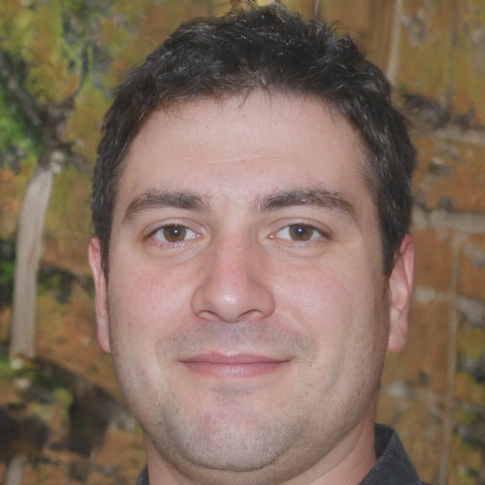 Professional headshot of game development instructor